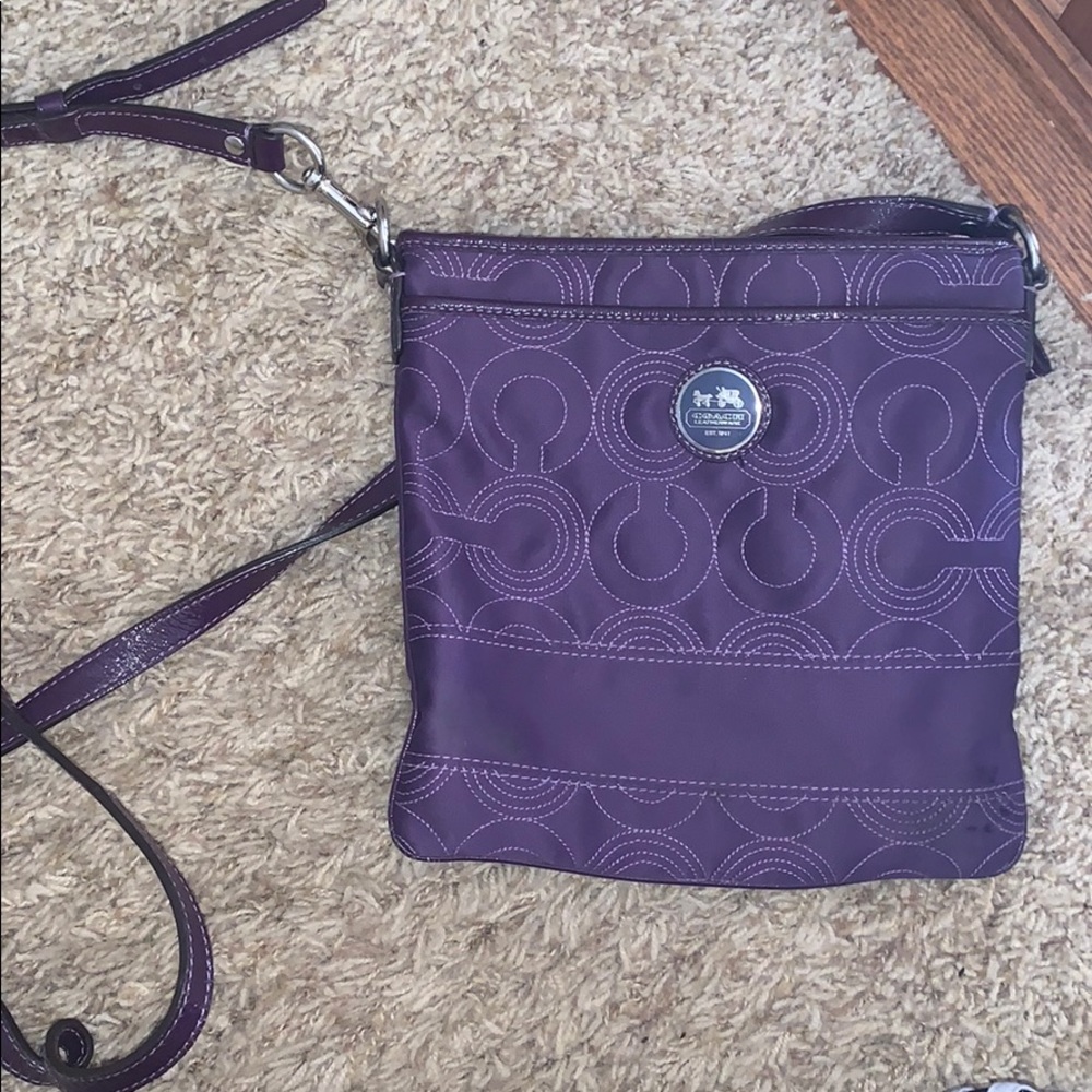 Purple Coach cross body purse